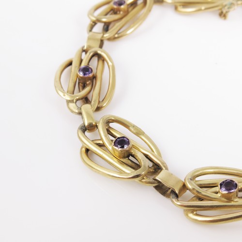 569 - 9CT GOLD AMETHYST SET BRACELET, APPROX. 12.8g