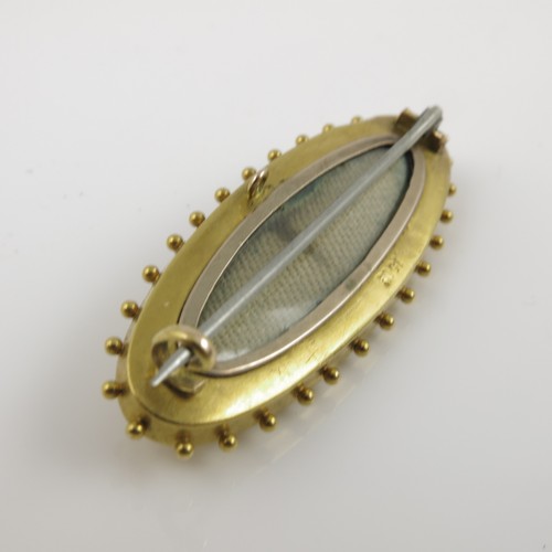 504 - VICTORIAN OVAL 15CT GOLD AND SEED PEARL BROOCH, APPROX. 5.6g