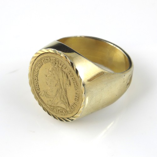 592 - YELLOW METAL RING SET WITH A VICTORIAN COIN