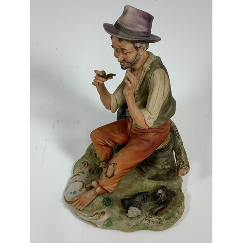 180 - CAPPODIMONTE FIGURINE OF A MAN SMOKING A PIPE, APPROX. 25 CM TALL, SIGNED, TWO PLATES & A SPIRIT KET... 