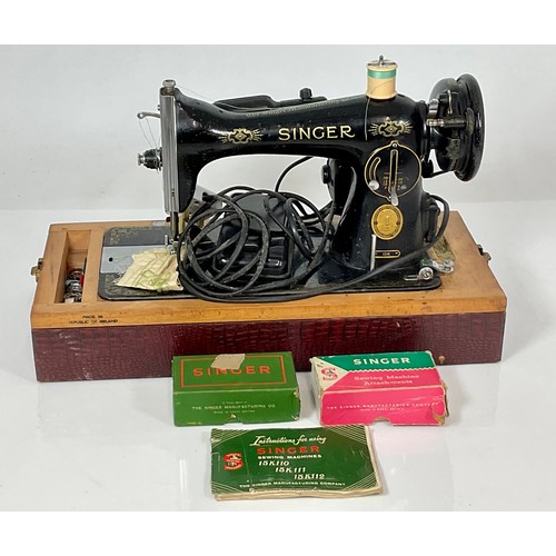 324 - SINGER ELECTRIC SEWING MACHINE