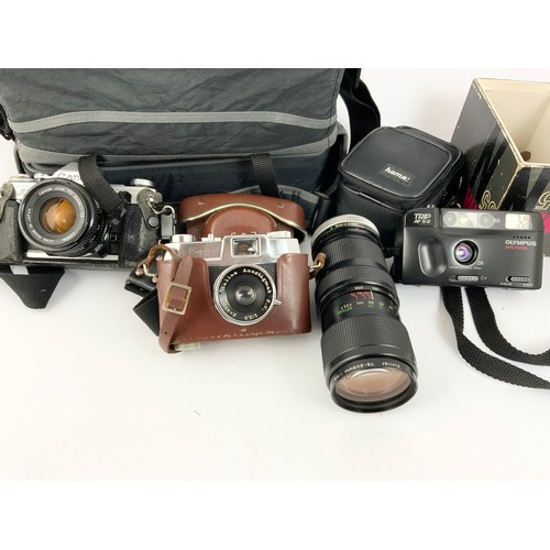 417 - MISC. CAMERAS AND ACCESSORIES INC. CANON AT-1 35 mm, HALINA, OLYMPUS TRIP, VIVITAR 75-205 mm LENS ET... 