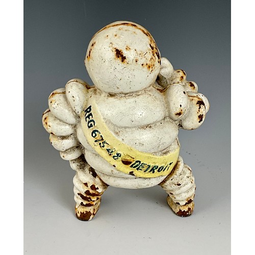 4 - SMALL CAST IRON MICHELIN MAN, REGISTRATION MARK DETROIT VERSO, APPROX. 15 cm