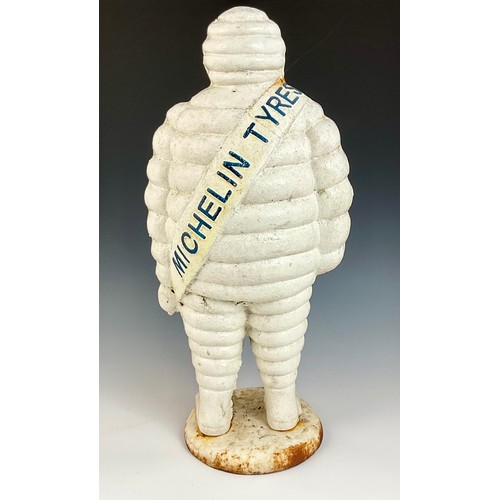 7 - VERY LARGE CAST IRON MICHELIN MAN, APPROX. 56 cm