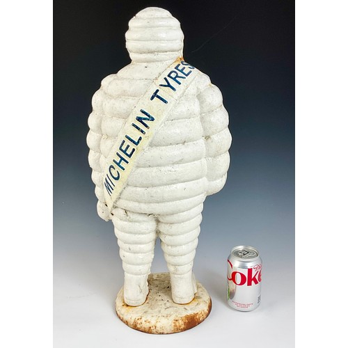 7 - VERY LARGE CAST IRON MICHELIN MAN, APPROX. 56 cm