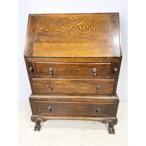 628 - CARVED OAK BUREAU ON BALL & CLAW FEET  103cm TALL