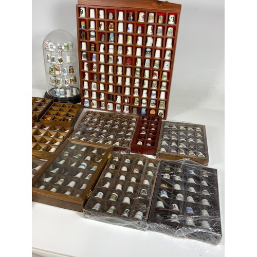 182 - A VERY LARGE COLLECTION OF THIMBLES IN DISPLAY BOXES AND CASES, MANY PORCELAIN BUT SOME METAL AND WO... 
