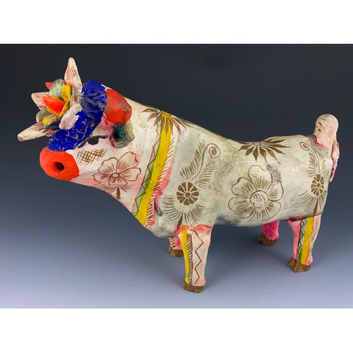 111 - UNUSUAL HAND MODELLED AND PAINTED STUDY OF A COW 40cm LONG