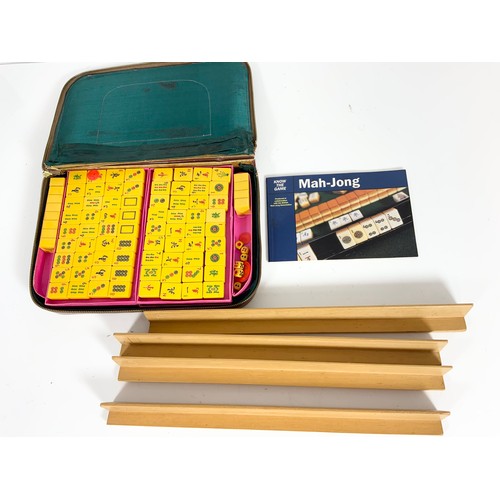 348 - CASED MAH JONG SET AND 4 WOODEN TILE HOLDERS