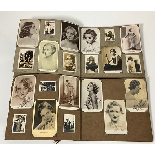 44 - TWO PHOTOGRAPH ALBUMS CONTAINING PHOTOGRAPHS AND POSTCARDS, MANY SIGNED DEPICTING EARLY STARS OF THE... 