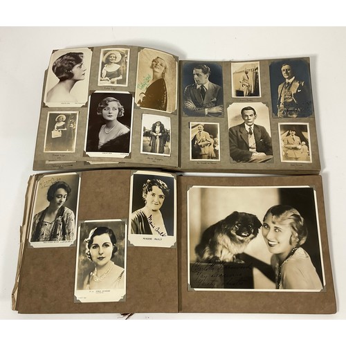 44 - TWO PHOTOGRAPH ALBUMS CONTAINING PHOTOGRAPHS AND POSTCARDS, MANY SIGNED DEPICTING EARLY STARS OF THE... 