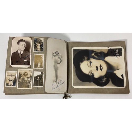 44 - TWO PHOTOGRAPH ALBUMS CONTAINING PHOTOGRAPHS AND POSTCARDS, MANY SIGNED DEPICTING EARLY STARS OF THE... 