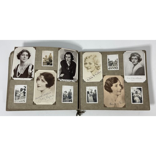 44 - TWO PHOTOGRAPH ALBUMS CONTAINING PHOTOGRAPHS AND POSTCARDS, MANY SIGNED DEPICTING EARLY STARS OF THE... 