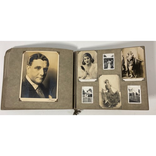 44 - TWO PHOTOGRAPH ALBUMS CONTAINING PHOTOGRAPHS AND POSTCARDS, MANY SIGNED DEPICTING EARLY STARS OF THE... 