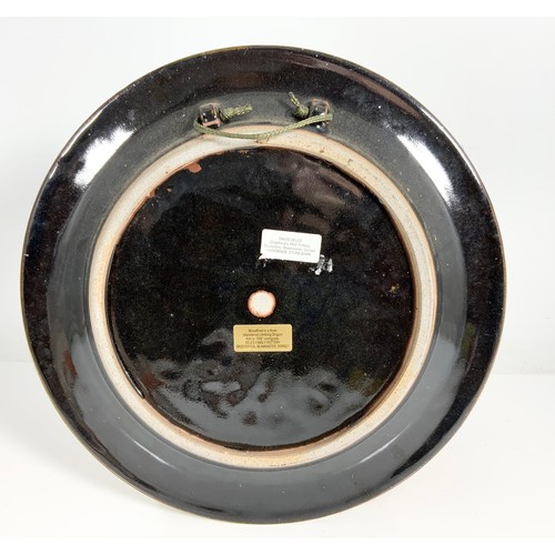 130 - DAVID EELES HANDMADE STONEWARE CHARGER DEPICTING A RAVEN 35cm DIAMETER