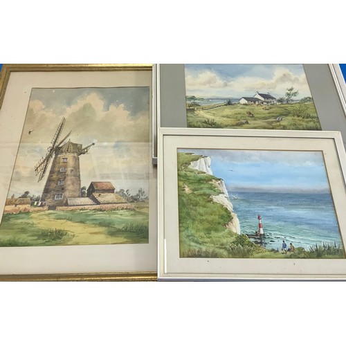 27 - JOAN MORGAN, VARIOUS WATERCOLOURS, WINDMILL, BEACHED BOAT AND VILLAGE SCENE, HEADLAND SCENE AND A SE... 