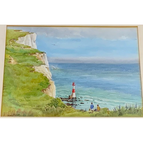 27 - JOAN MORGAN, VARIOUS WATERCOLOURS, WINDMILL, BEACHED BOAT AND VILLAGE SCENE, HEADLAND SCENE AND A SE... 