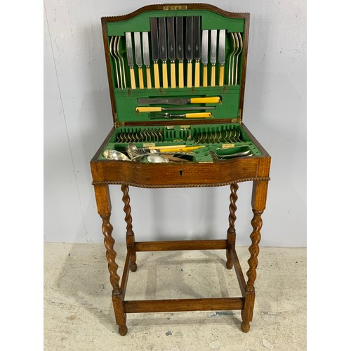 395 - PART  WALKER & HALL CANTEEN OF CUTLERY ON OAK STAND WITH BARLEY TWIST LEGS