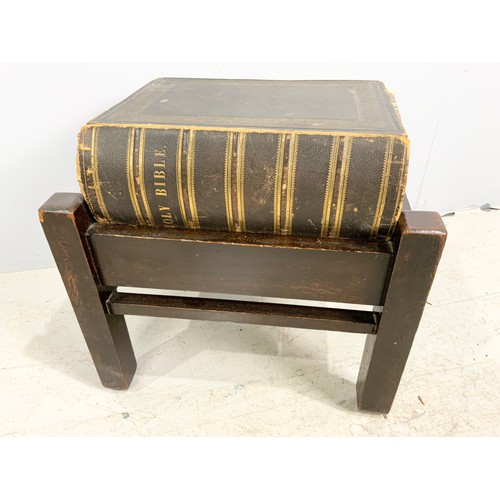 63 - LARGE FAMILY BIBLE ON WOODEN STAND