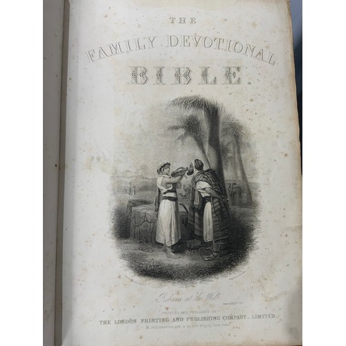 63 - LARGE FAMILY BIBLE ON WOODEN STAND