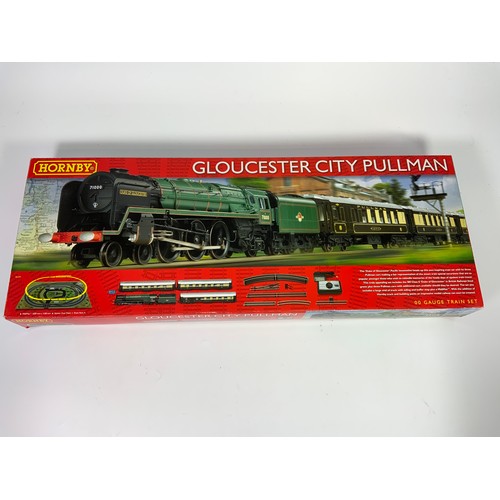 499 - HORNBY R1177 GLOUCESTER CITY PULLMAN TRAIN SET WITH 71000 DUKE OF GLOUCESTER & 3 COACHES.