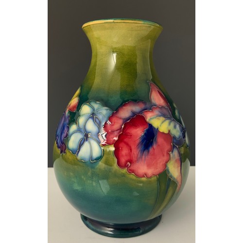 37 - MOORCROFT IRIS PATTERN VASE, APPROX. 16 cm