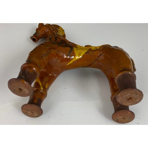 57 - A TURKISH POTTERY MODEL OF A HORSE, APPROX. 24 cm high