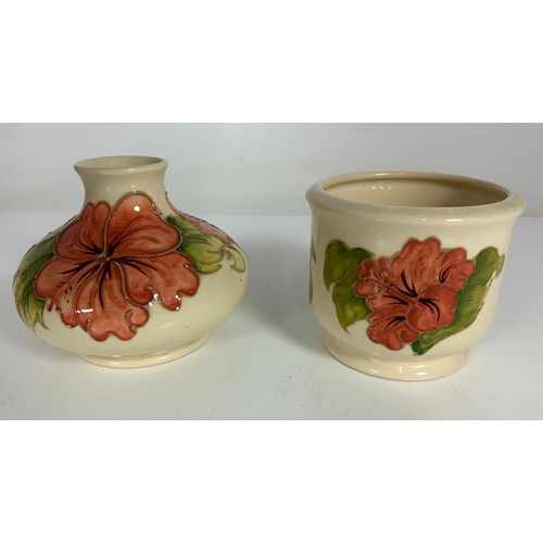 40 - TWO PIECES OF CREAM GROUND MOORCROFT POTTERY, SQUAT VASE A/F AND ONE OTHER