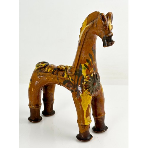 57 - A TURKISH POTTERY MODEL OF A HORSE, APPROX. 24 cm high