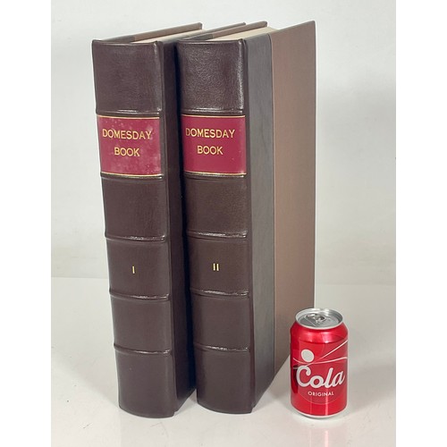 75 - BOOK TWO VOLUMES, THE DOMESDAY BOOK, BASIL HARLEY COIN INSET TO FRONT COVERS, LEATHER BINDINGS