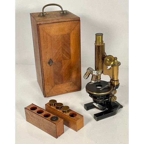 120 - LEITZ ENCASED BRASS AND LACQUERED MICROSCOPE WITH EXTRA LENSES AND FITMENTS IN A GOOD QUALITY MAHOGA... 