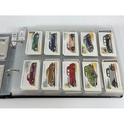 118 - A CIGARETTE CARD ALBUM CONTAINING 26 SETS OF ORIGINAL CARDS, MOSTLY G/VG, CATALOGUE £490+