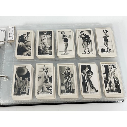 118 - A CIGARETTE CARD ALBUM CONTAINING 26 SETS OF ORIGINAL CARDS, MOSTLY G/VG, CATALOGUE £490+