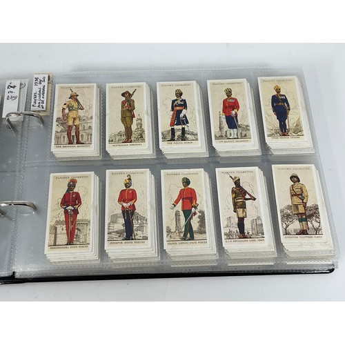 118 - A CIGARETTE CARD ALBUM CONTAINING 26 SETS OF ORIGINAL CARDS, MOSTLY G/VG, CATALOGUE £490+