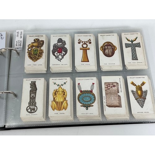 118 - A CIGARETTE CARD ALBUM CONTAINING 26 SETS OF ORIGINAL CARDS, MOSTLY G/VG, CATALOGUE £490+