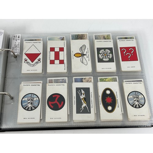 118 - A CIGARETTE CARD ALBUM CONTAINING 26 SETS OF ORIGINAL CARDS, MOSTLY G/VG, CATALOGUE £490+