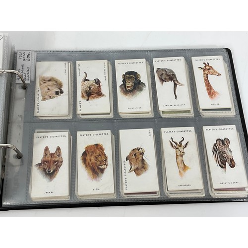 118 - A CIGARETTE CARD ALBUM CONTAINING 26 SETS OF ORIGINAL CARDS, MOSTLY G/VG, CATALOGUE £490+