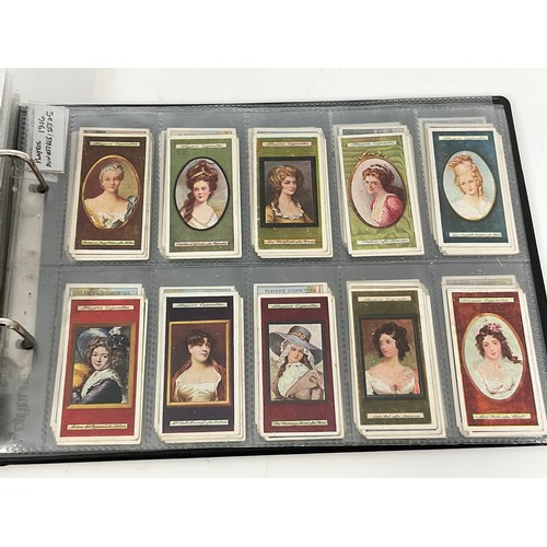 118 - A CIGARETTE CARD ALBUM CONTAINING 26 SETS OF ORIGINAL CARDS, MOSTLY G/VG, CATALOGUE £490+