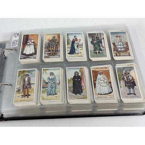 118 - A CIGARETTE CARD ALBUM CONTAINING 26 SETS OF ORIGINAL CARDS, MOSTLY G/VG, CATALOGUE £490+