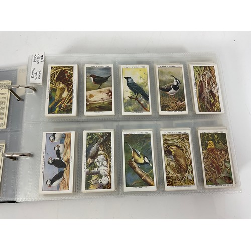 119 - A CIGARETTE CARD ALBUM CONTAINING 26 SETS OF ORIGINAL CARDS, MOSTLY G/VG, CATALOGUE £490+