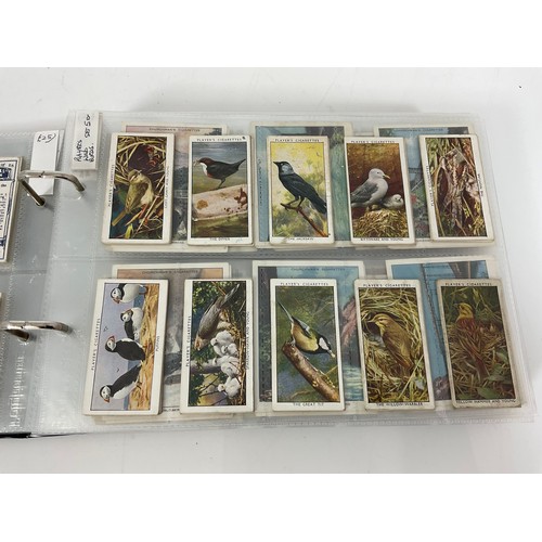 119 - A CIGARETTE CARD ALBUM CONTAINING 26 SETS OF ORIGINAL CARDS, MOSTLY G/VG, CATALOGUE £490+