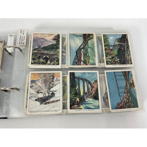 119 - A CIGARETTE CARD ALBUM CONTAINING 26 SETS OF ORIGINAL CARDS, MOSTLY G/VG, CATALOGUE £490+