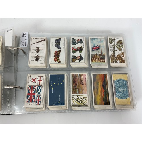 119 - A CIGARETTE CARD ALBUM CONTAINING 26 SETS OF ORIGINAL CARDS, MOSTLY G/VG, CATALOGUE £490+