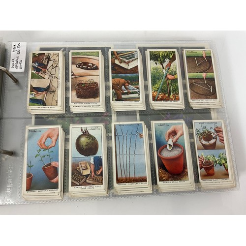 119 - A CIGARETTE CARD ALBUM CONTAINING 26 SETS OF ORIGINAL CARDS, MOSTLY G/VG, CATALOGUE £490+