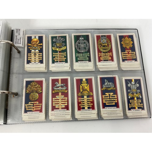 119 - A CIGARETTE CARD ALBUM CONTAINING 26 SETS OF ORIGINAL CARDS, MOSTLY G/VG, CATALOGUE £490+