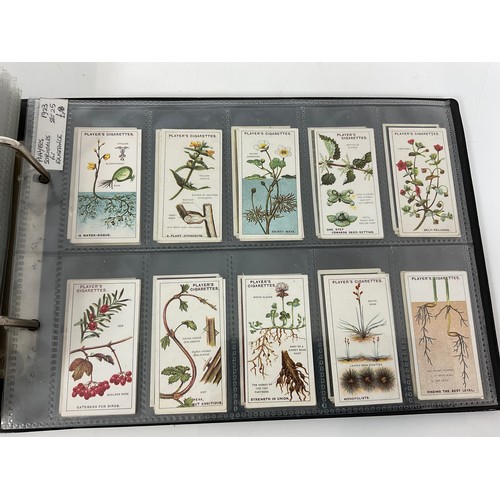 119 - A CIGARETTE CARD ALBUM CONTAINING 26 SETS OF ORIGINAL CARDS, MOSTLY G/VG, CATALOGUE £490+