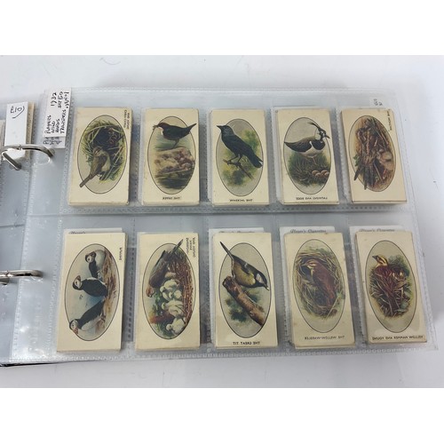 121 - A CIGARETTE CARD ALBUM CONTAINING 25 SETS OF ORIGINAL CARDS, MOSTLY G/VG, CATALOGUE £510+