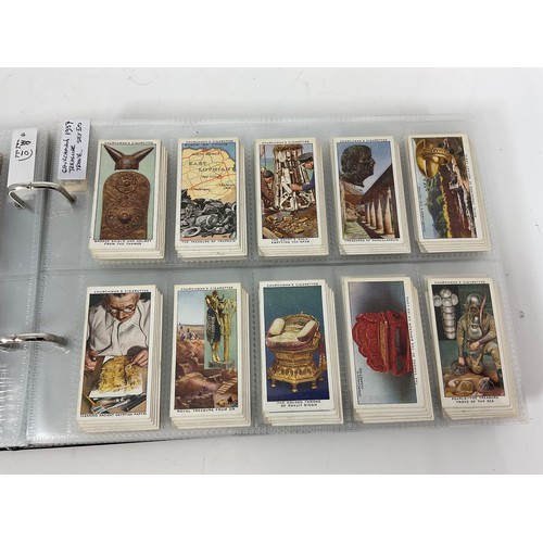 121 - A CIGARETTE CARD ALBUM CONTAINING 25 SETS OF ORIGINAL CARDS, MOSTLY G/VG, CATALOGUE £510+