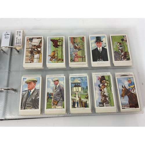 121 - A CIGARETTE CARD ALBUM CONTAINING 25 SETS OF ORIGINAL CARDS, MOSTLY G/VG, CATALOGUE £510+