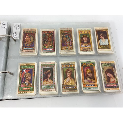 121 - A CIGARETTE CARD ALBUM CONTAINING 25 SETS OF ORIGINAL CARDS, MOSTLY G/VG, CATALOGUE £510+